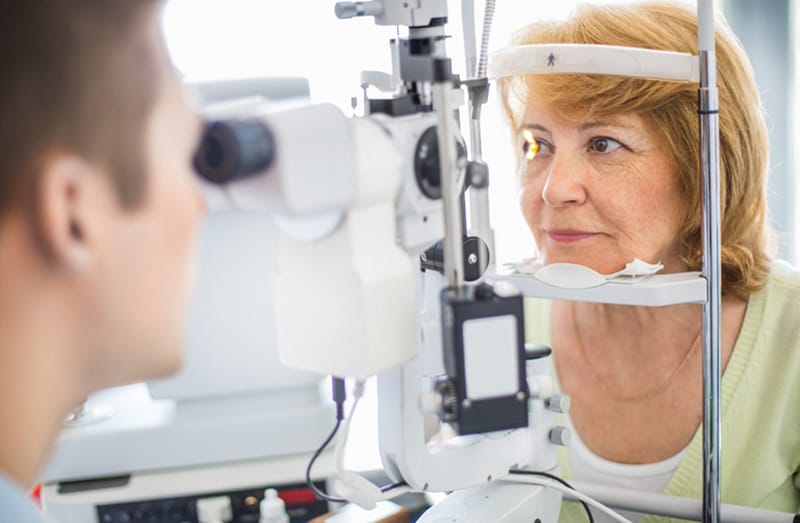 Senior woman eye exam
