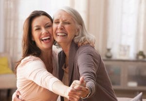 happy-family-caregiver-with-senior-mother