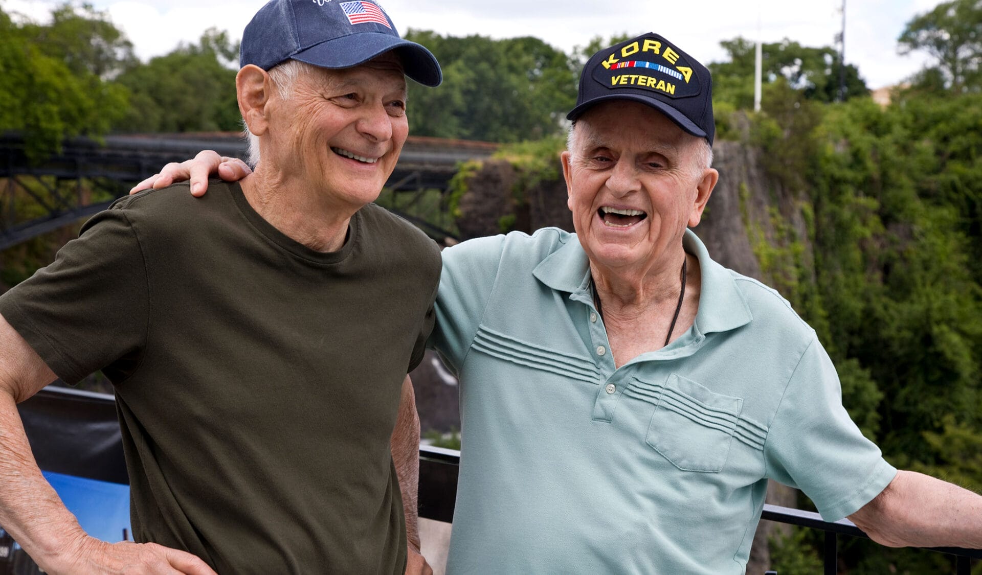 two veteran heros laughing
